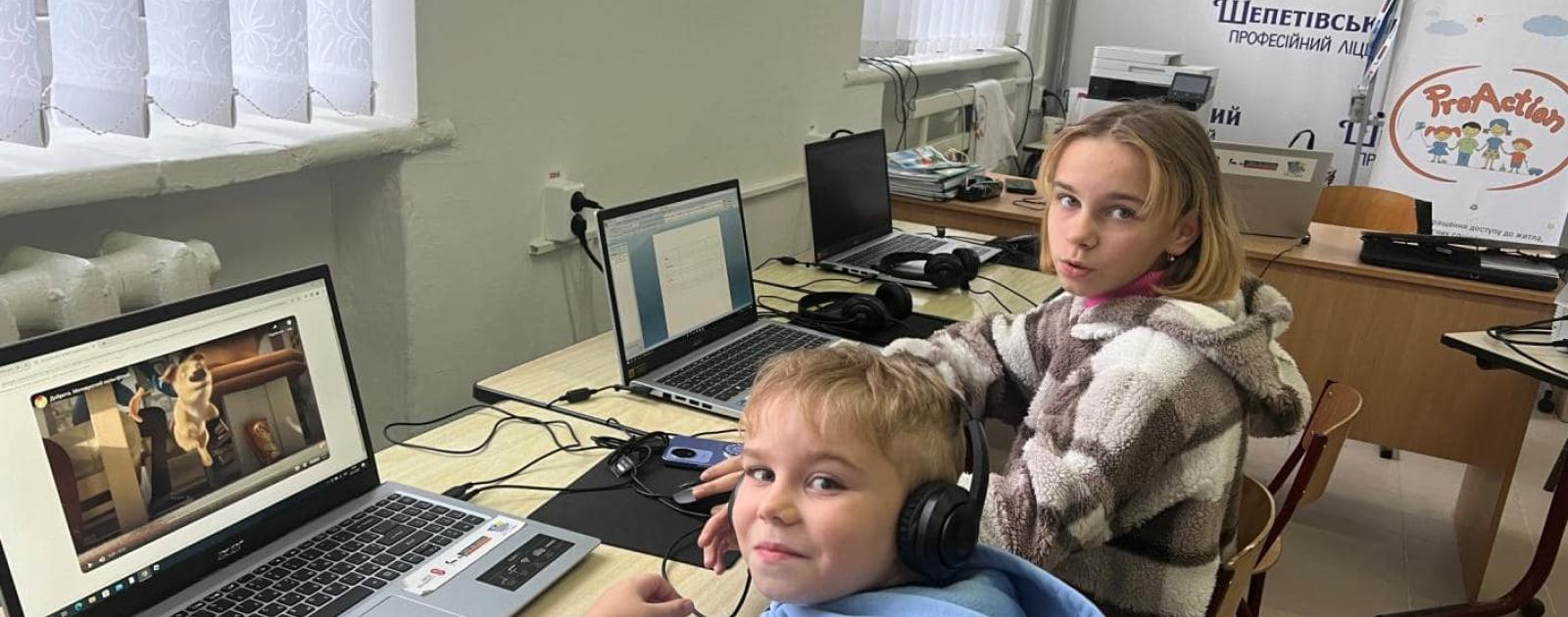 Children study at the computer